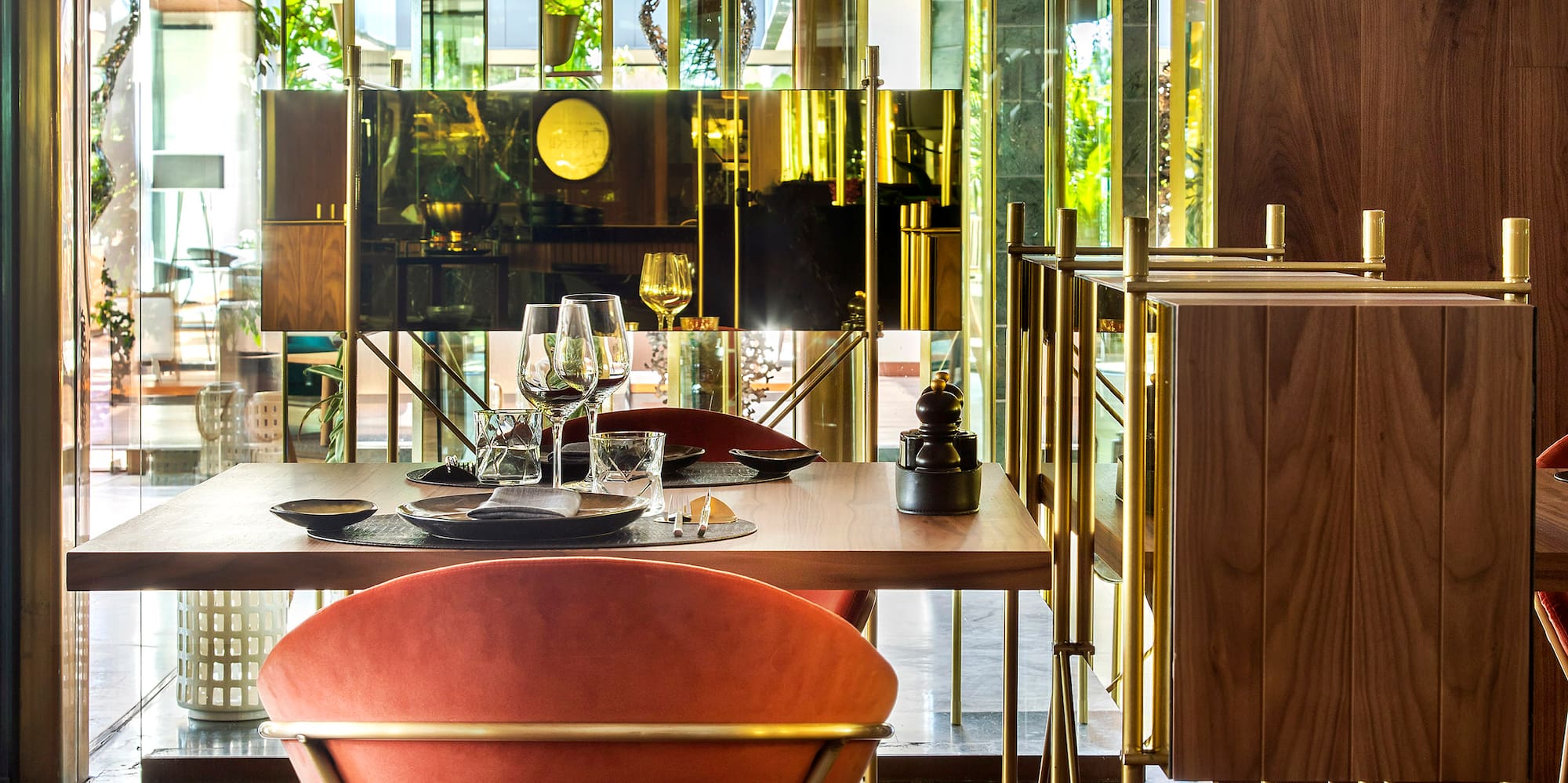 a dining room with a table and chairs