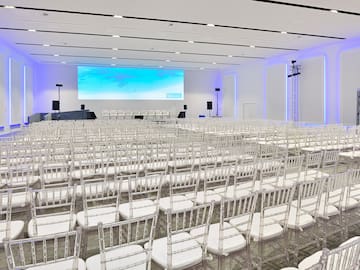a large room with rows of chairs