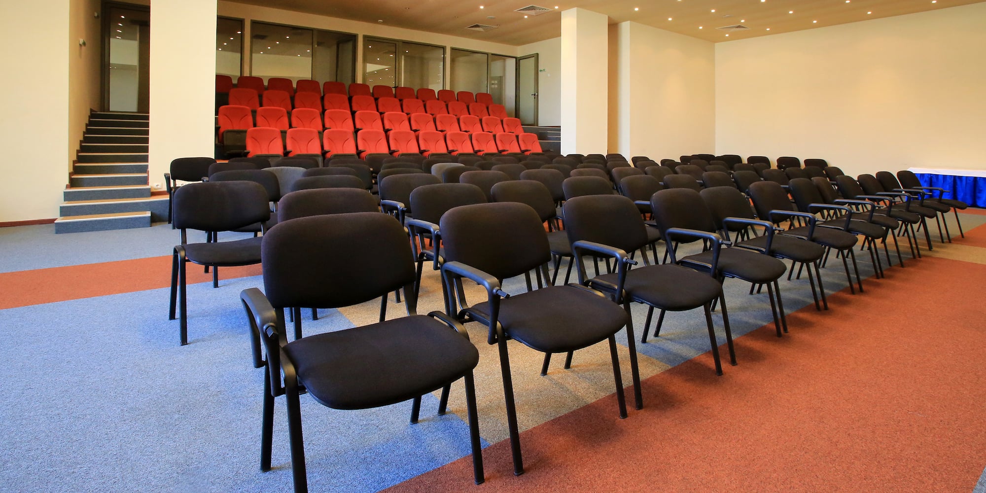 a room with rows of chairs