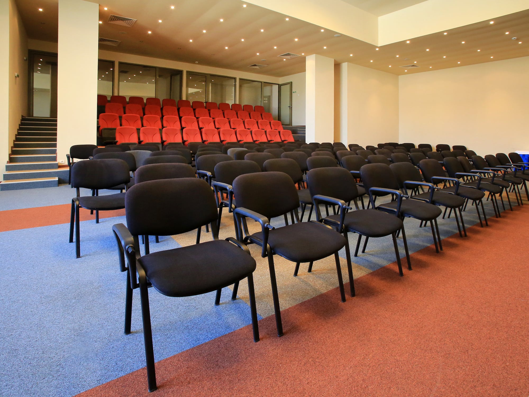 a room with rows of chairs