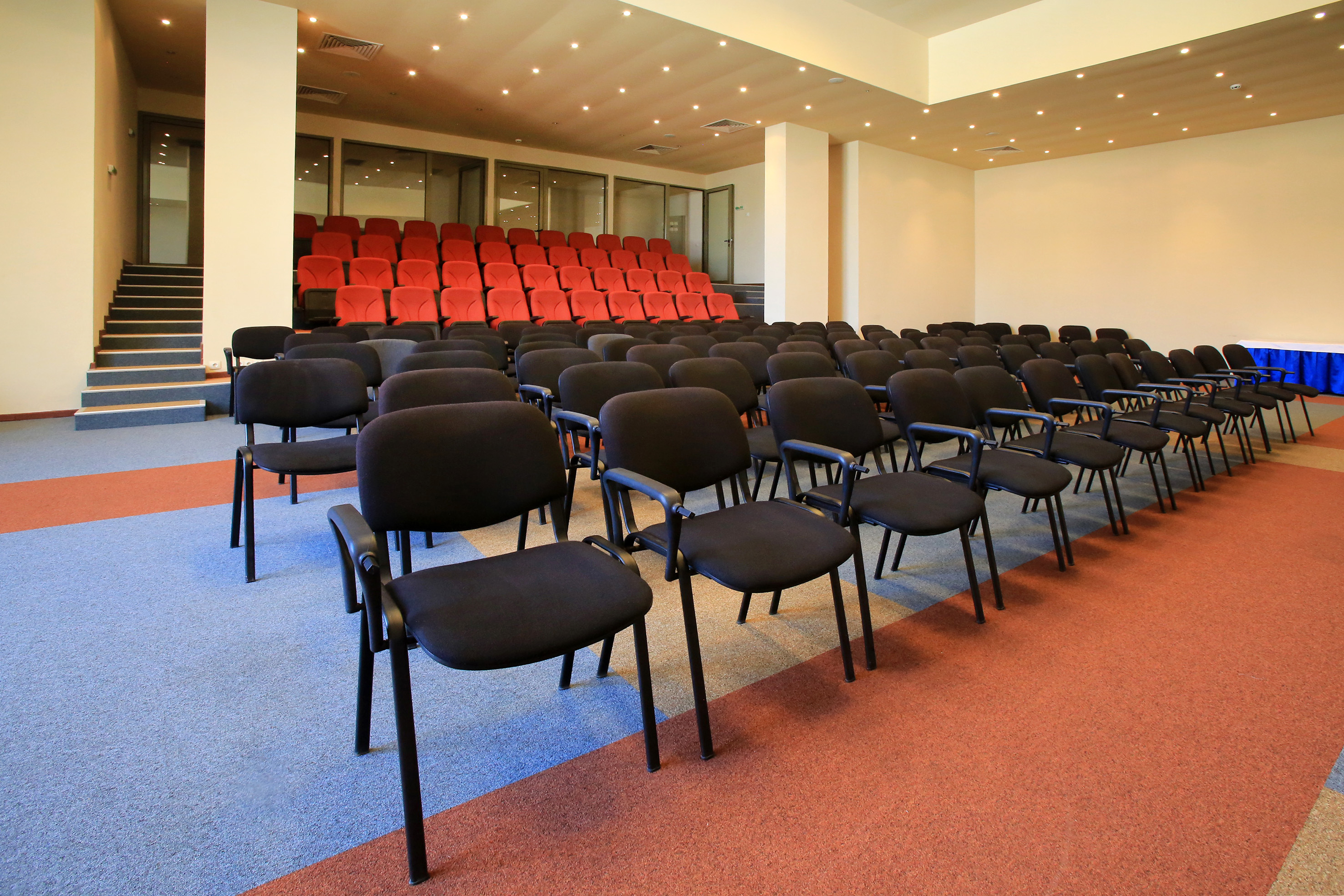 a room with rows of chairs