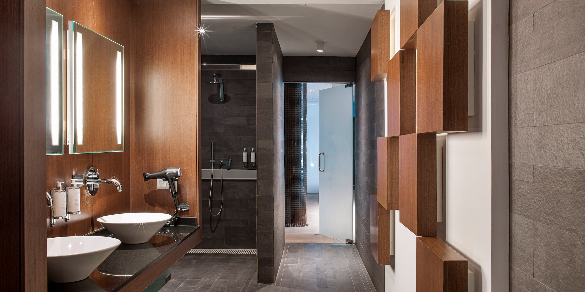 a bathroom with a sink and mirror