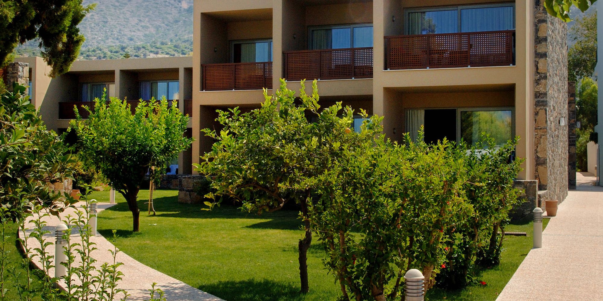 a building with trees and bushes