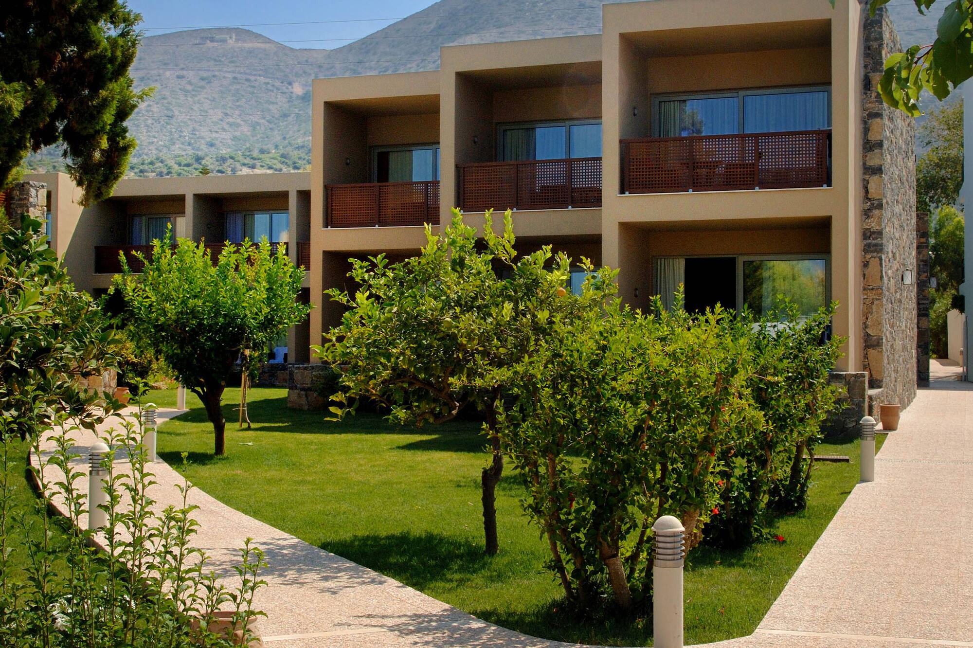 a building with trees and bushes
