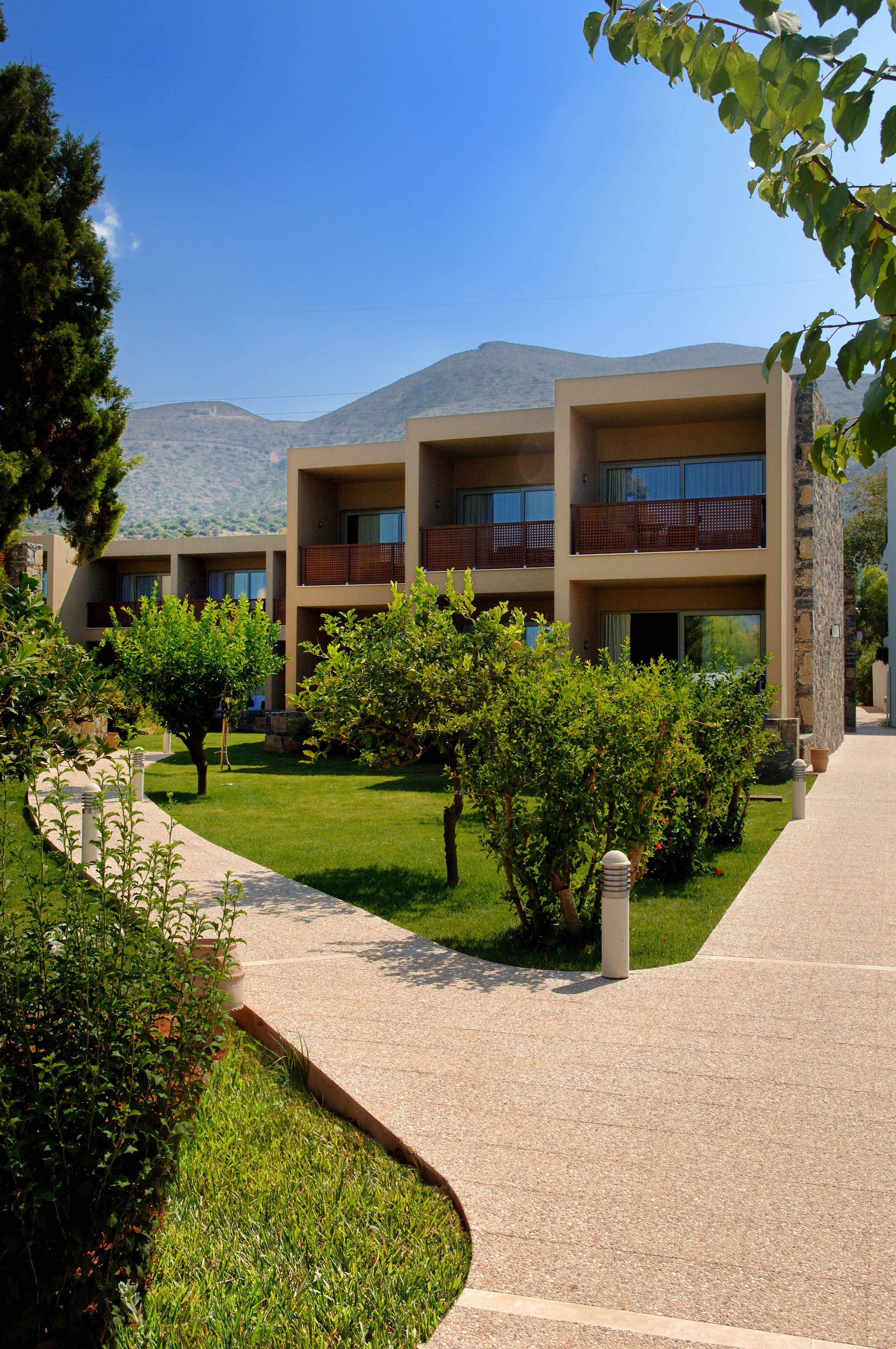 a building with trees and bushes