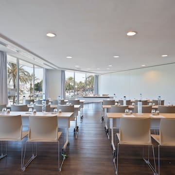 a room with tables and chairs