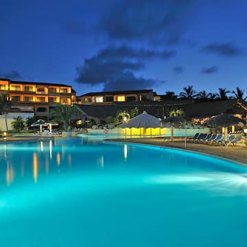 a pool with a building in the background