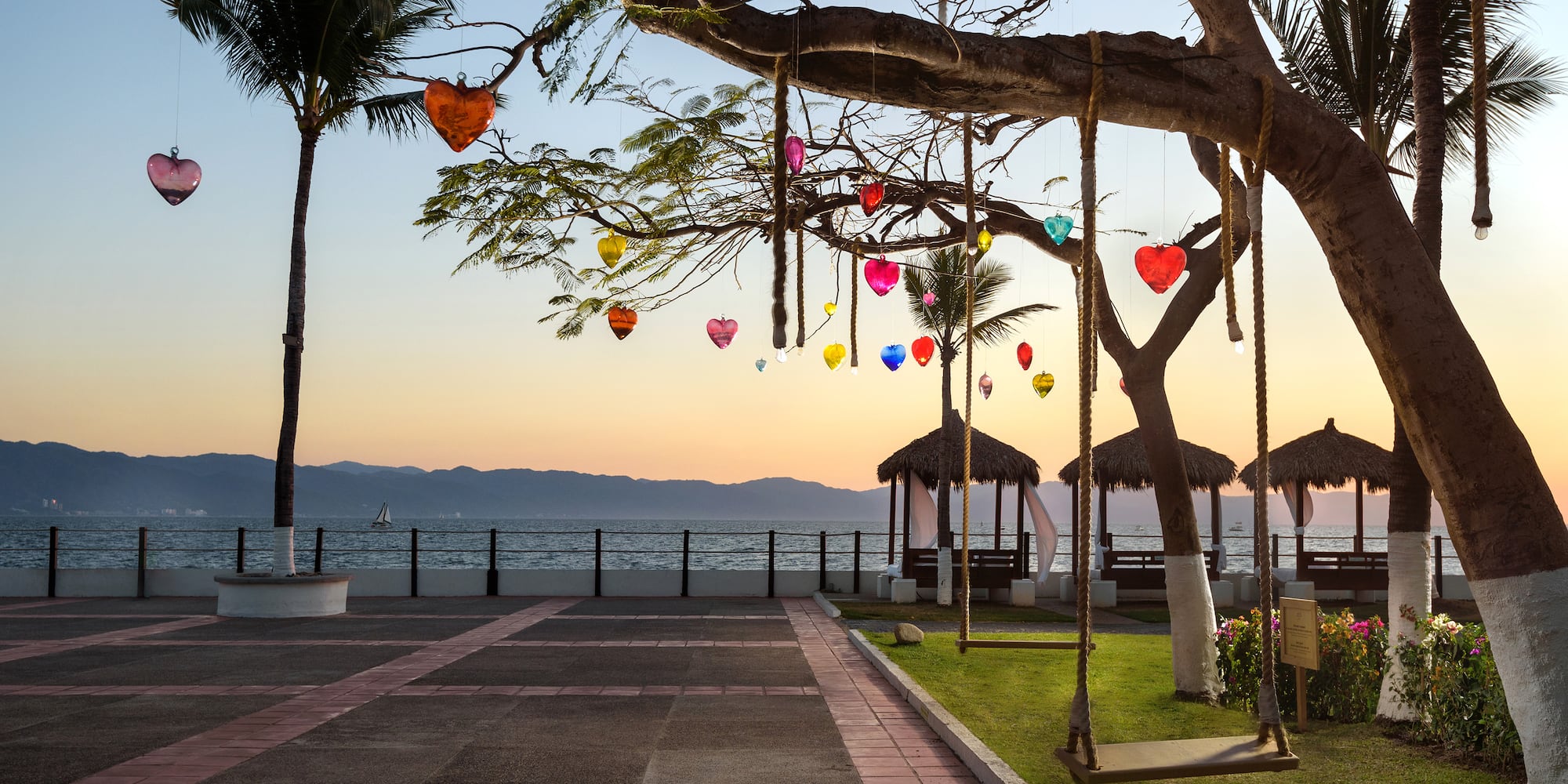a tree with colorful hearts from it
