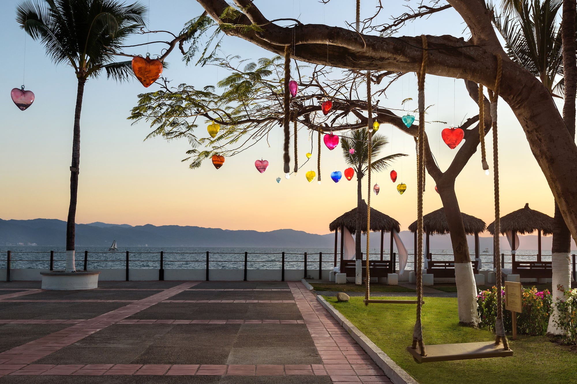 a tree with colorful hearts from it