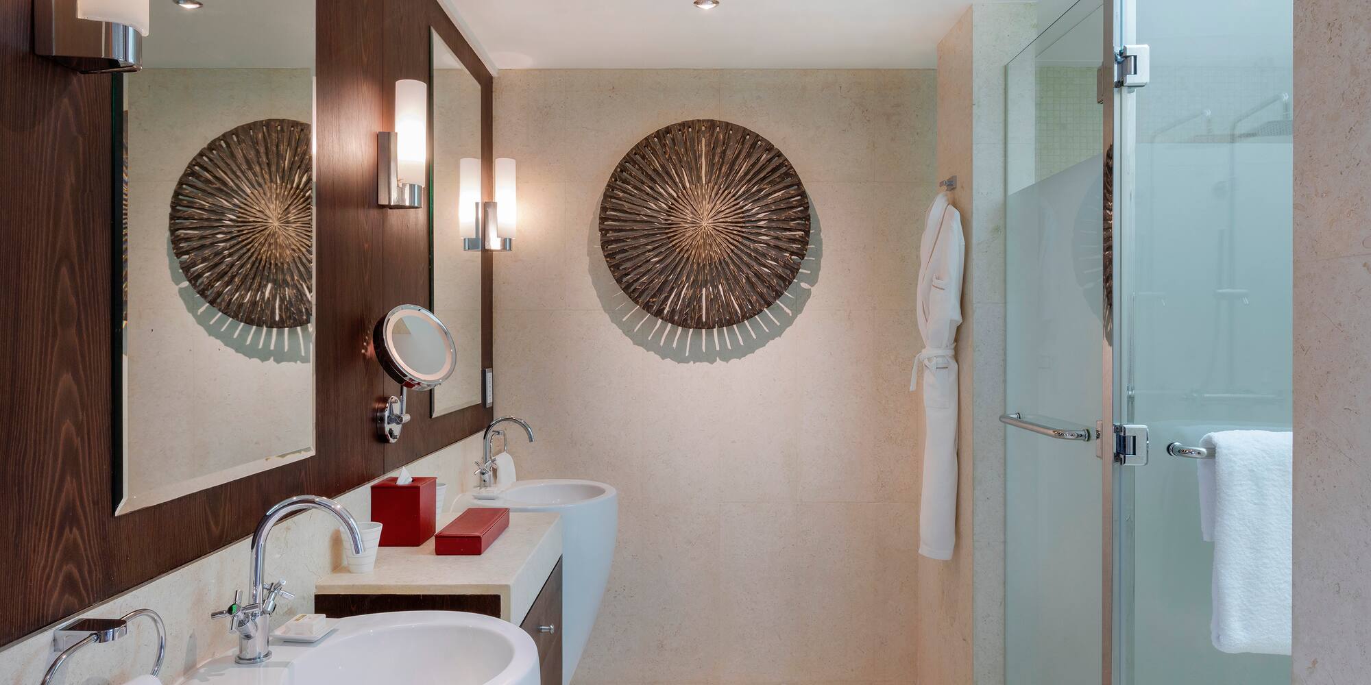 a bathroom with a mirror and sink