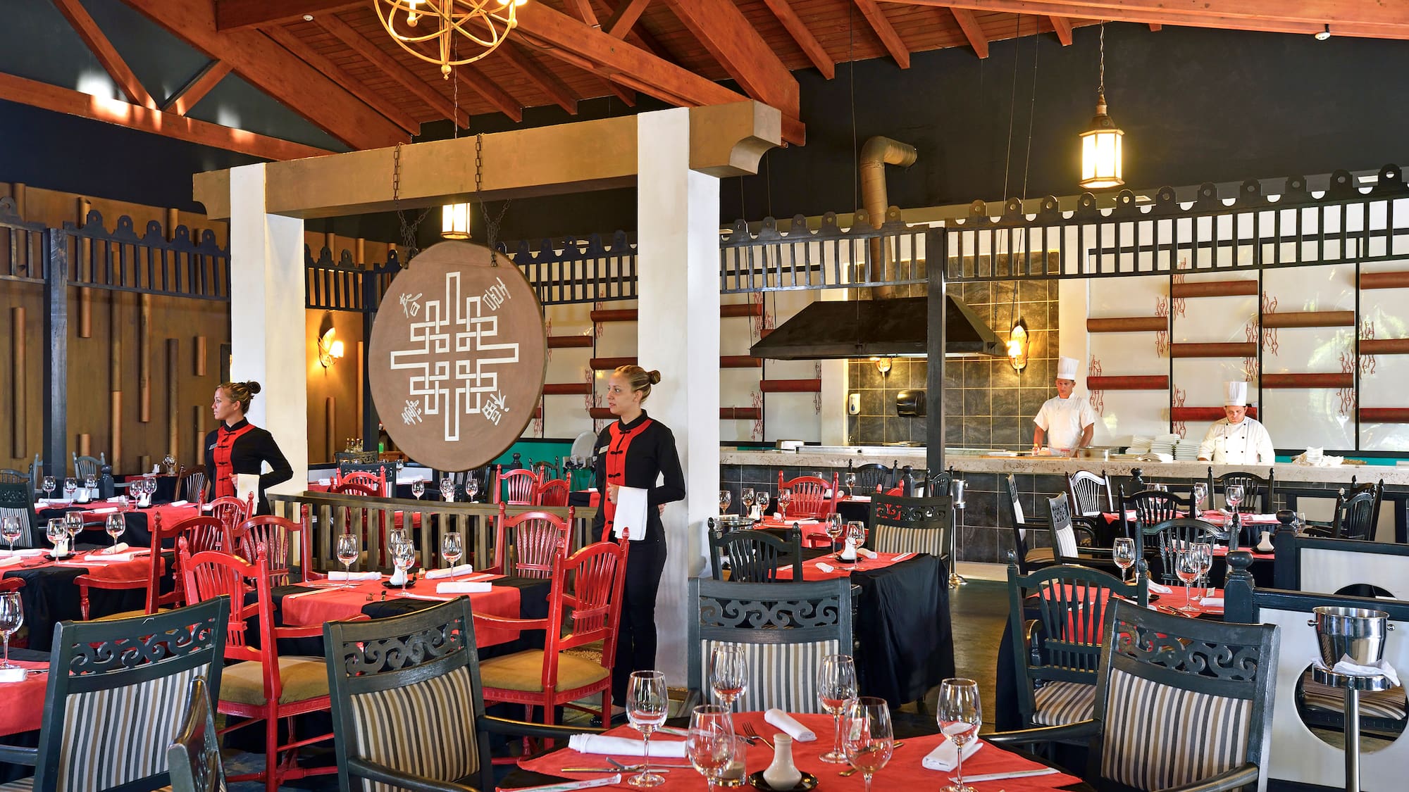 a restaurant with a couple of people in uniform