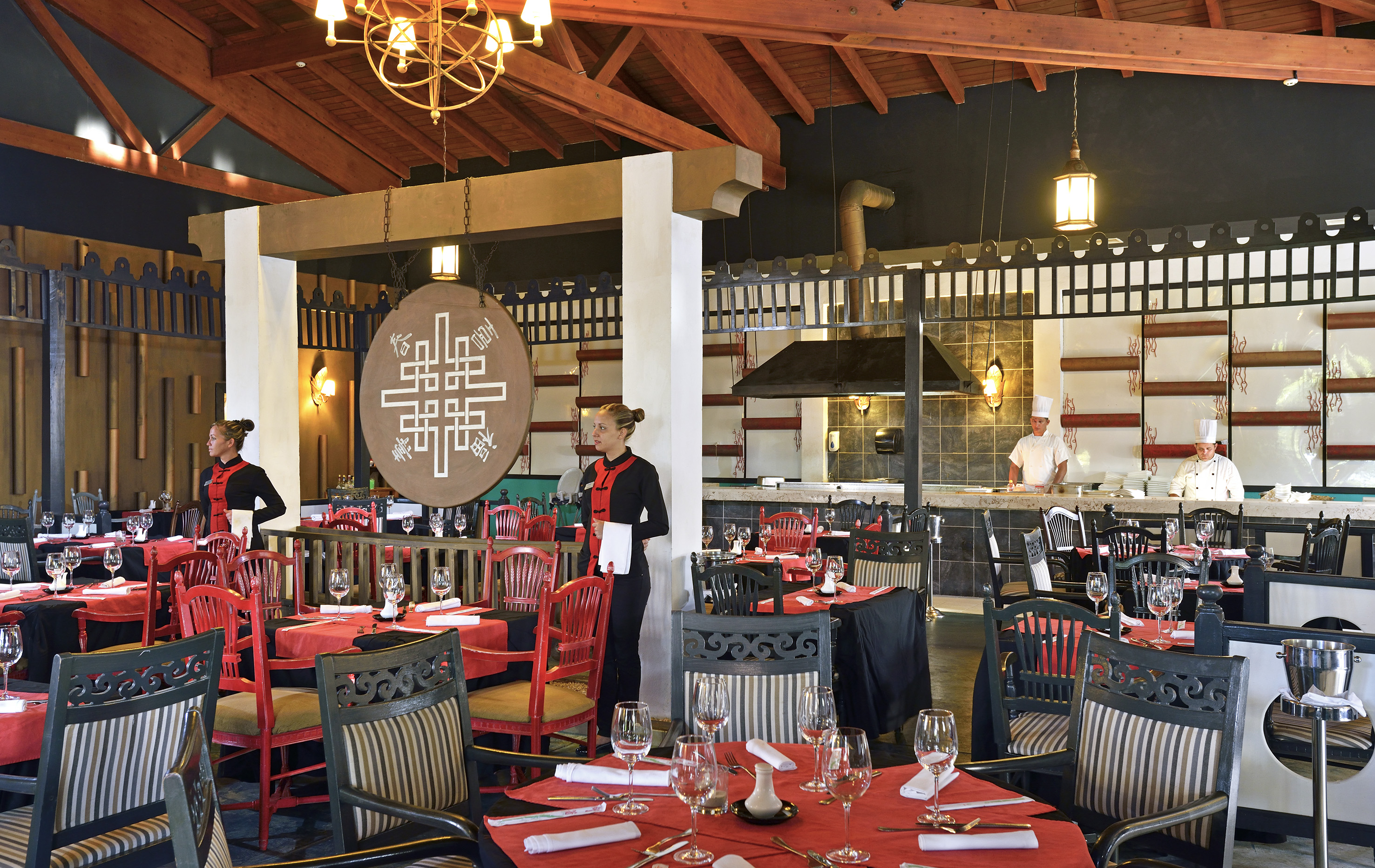 a restaurant with a couple of people in uniform