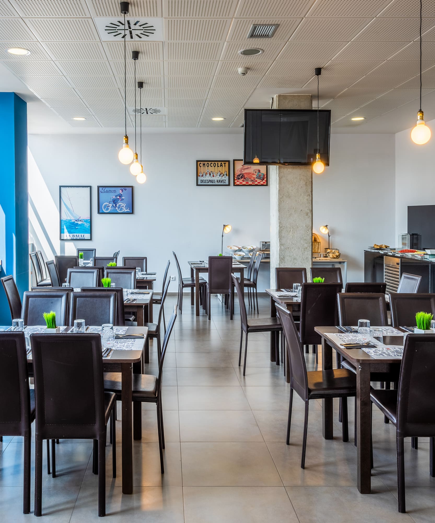 a room with tables and chairs