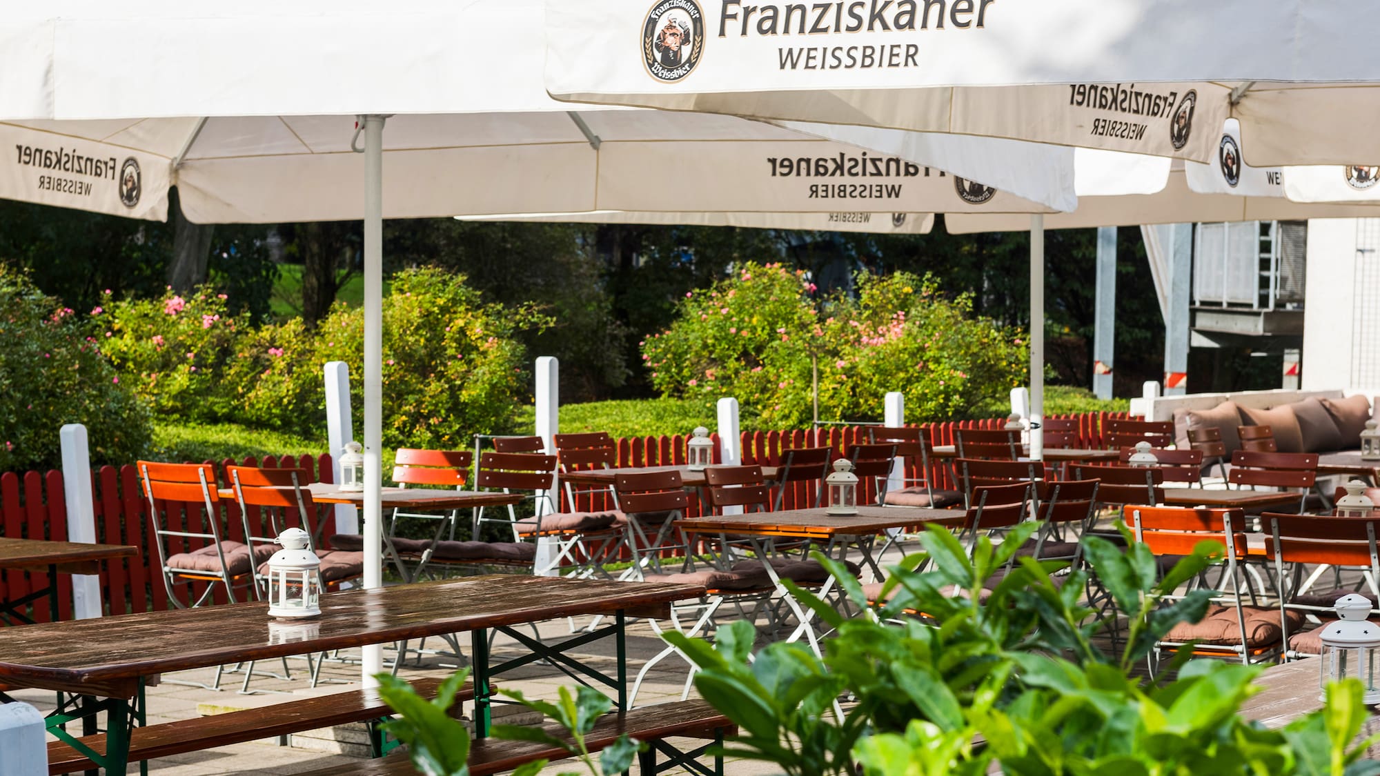 tables and chairs under a canopy