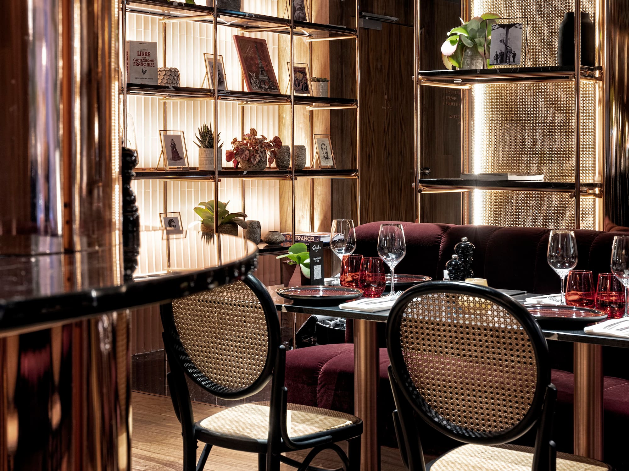 a restaurant with a table and chairs