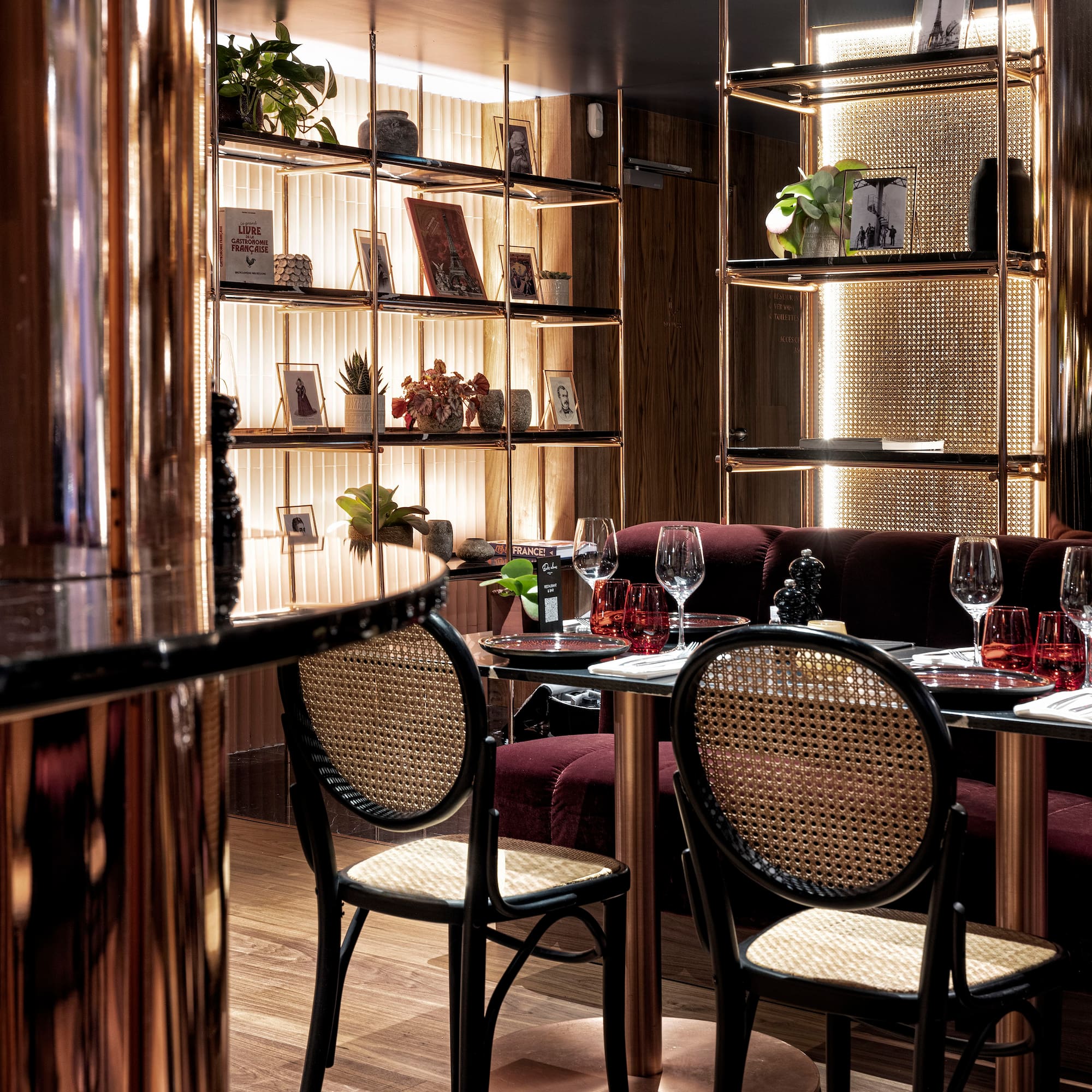 a restaurant with a table and chairs