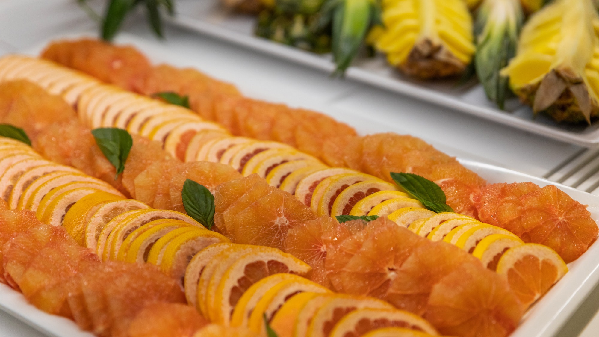 a plate of fruit slices