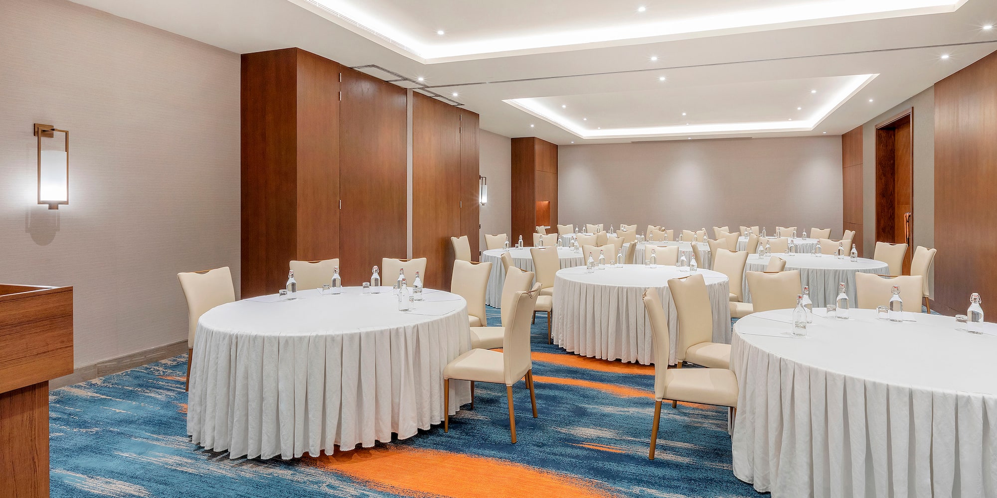 a room with tables and chairs