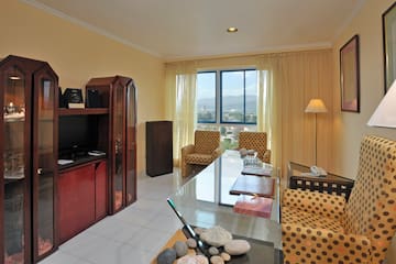a room with a television and a table