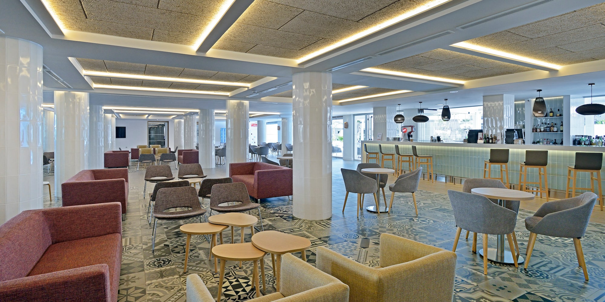 a room with chairs and tables