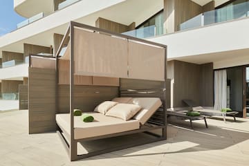 a bed on a patio
