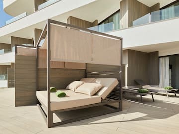 a bed on a patio