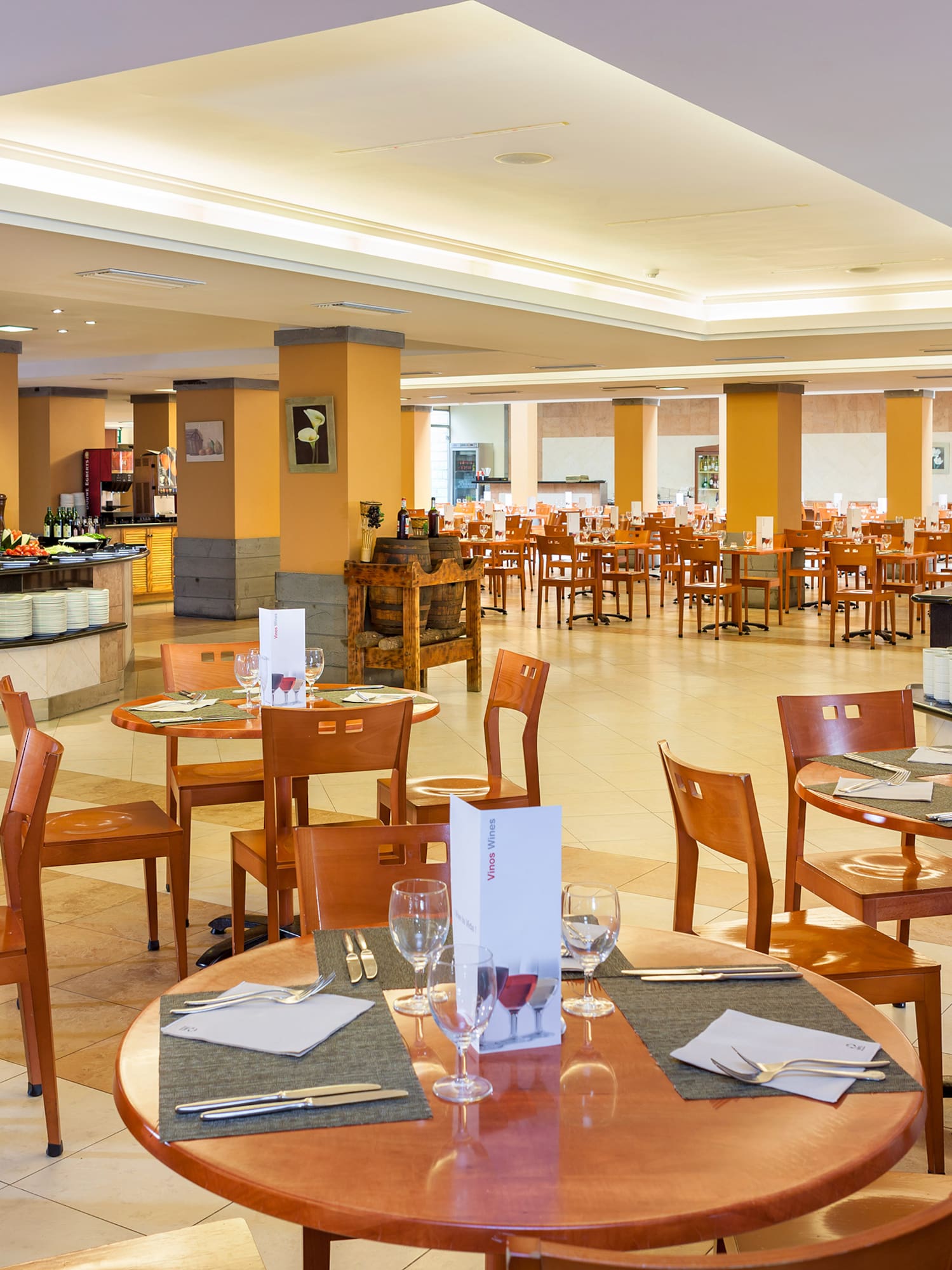 a restaurant with tables and chairs