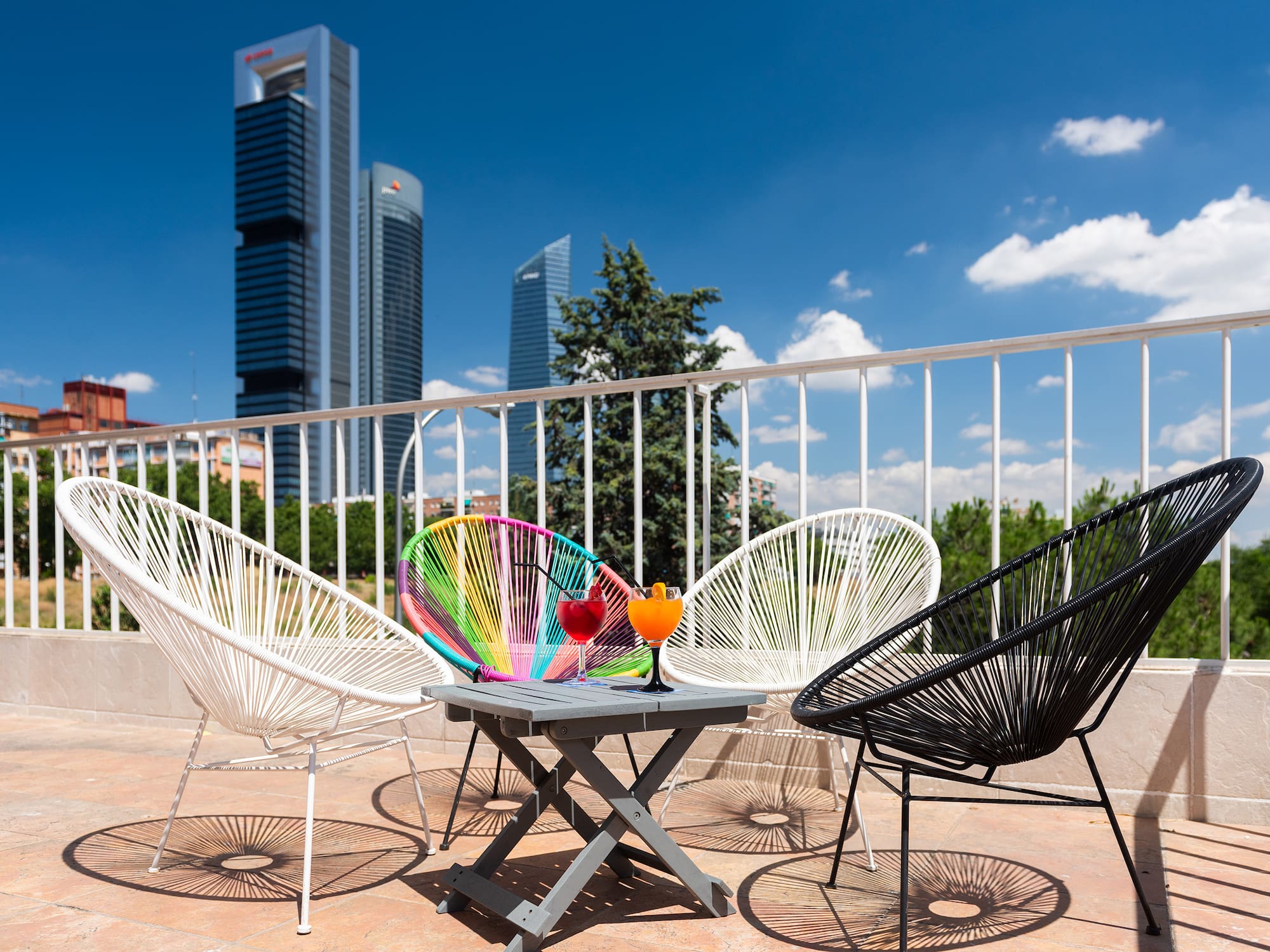a group of chairs on a patio