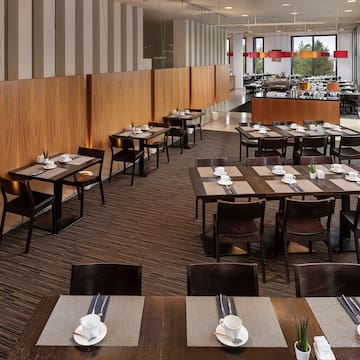 a room with tables and chairs