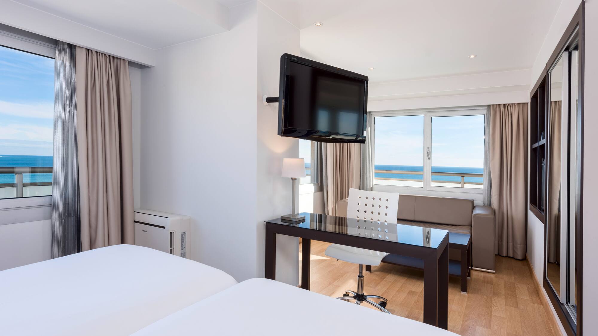 a room with a television mounted on the wall