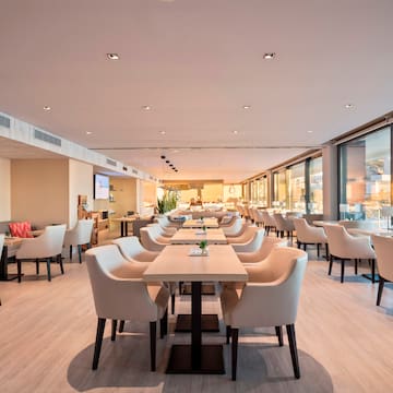 a room with tables and chairs