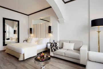 a room with a bed and couch
