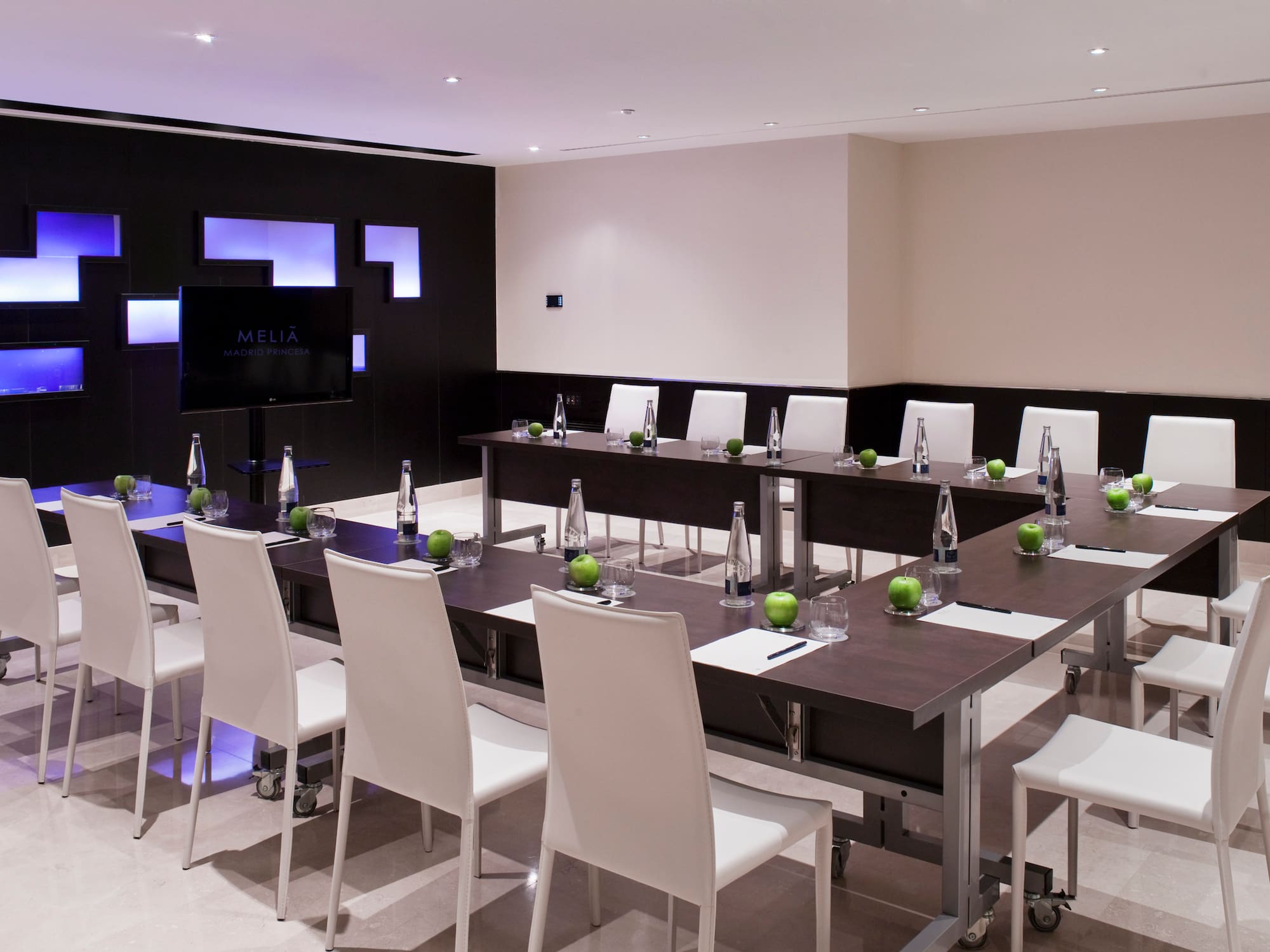 a room with a table and chairs