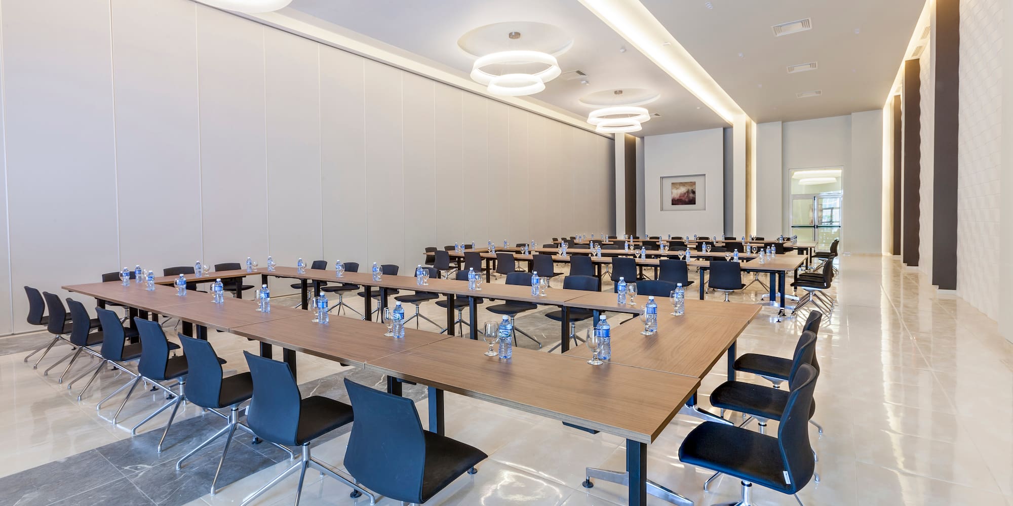 a room with tables and chairs