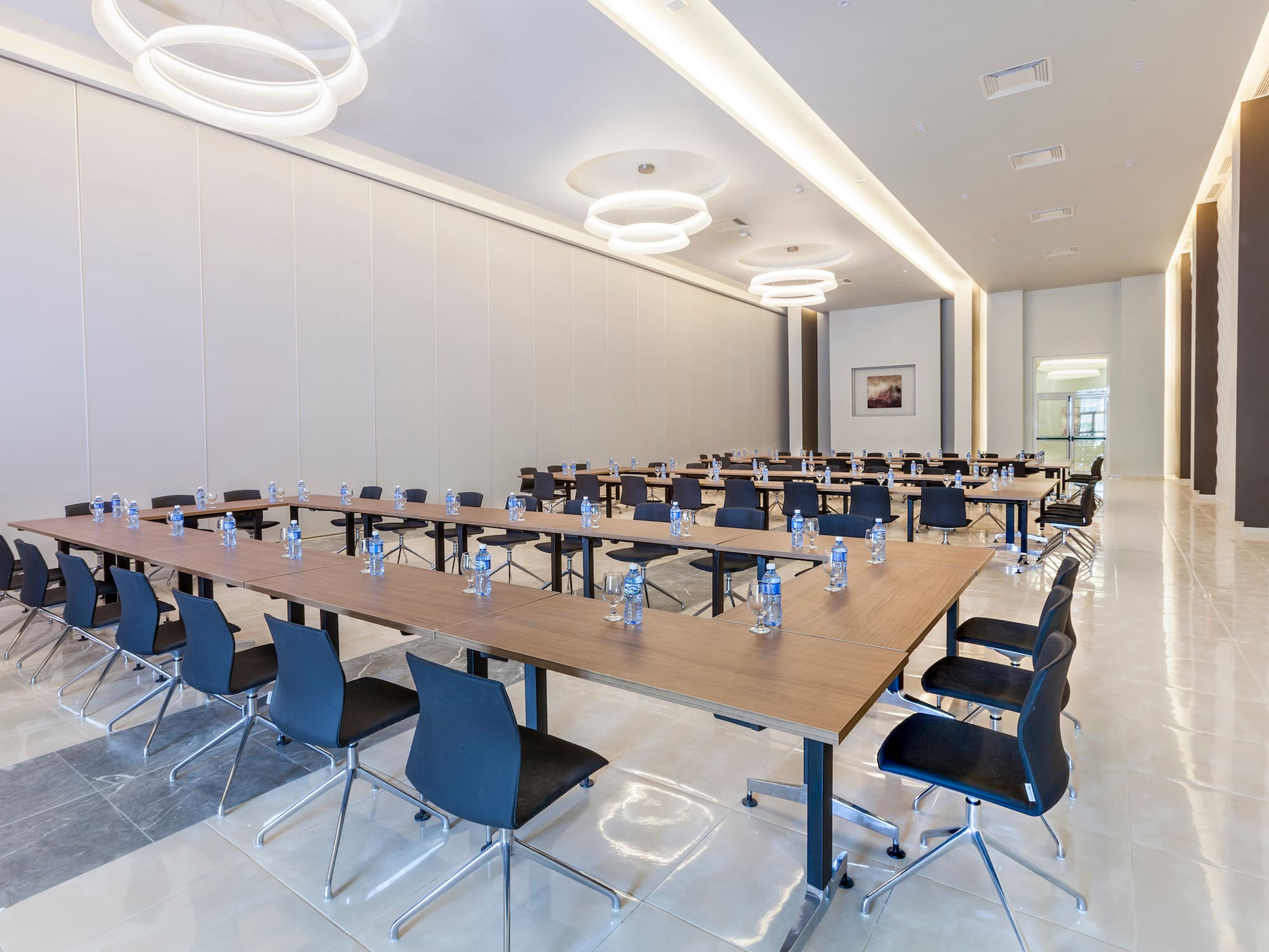 a room with tables and chairs