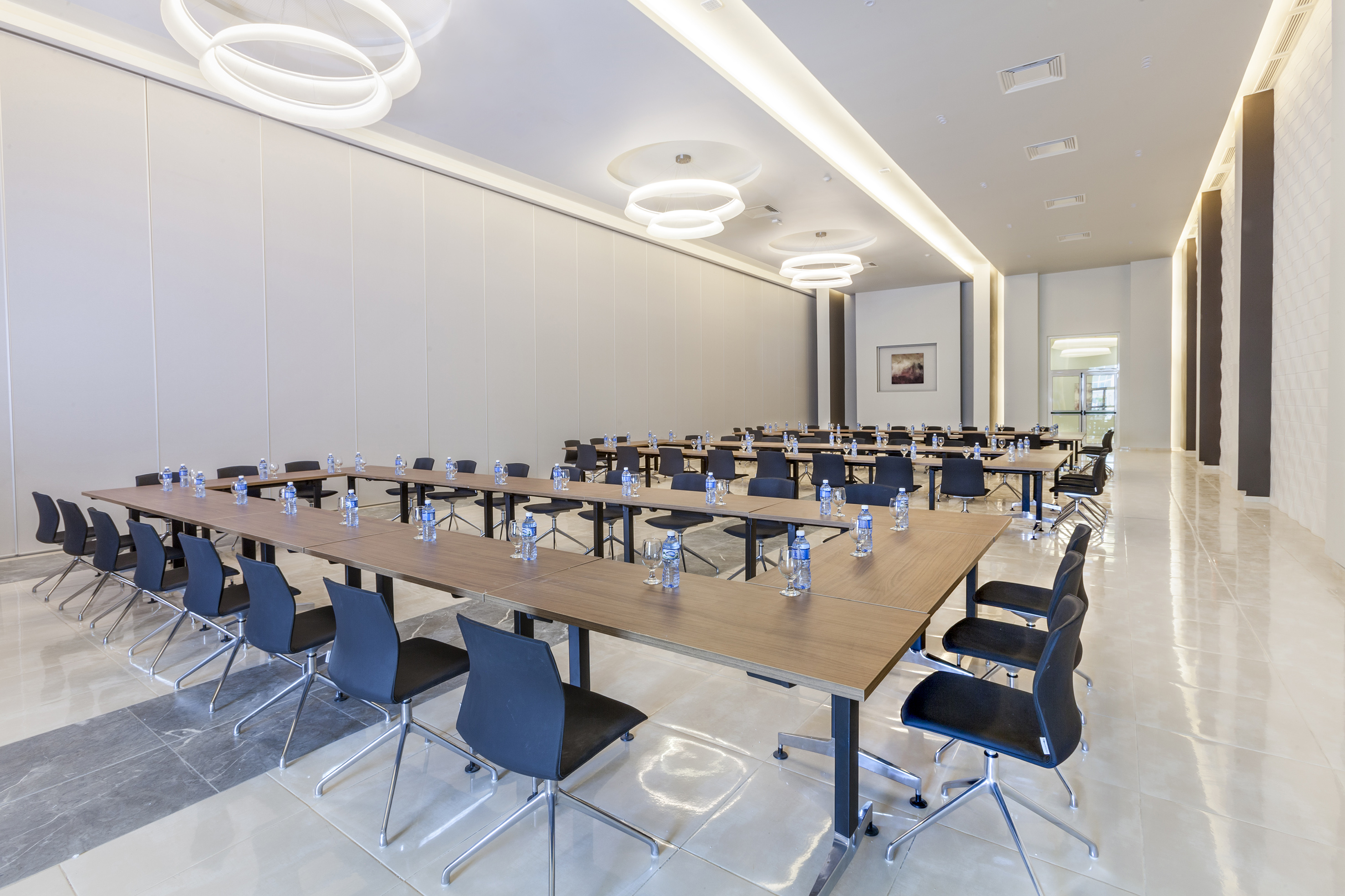 a room with tables and chairs