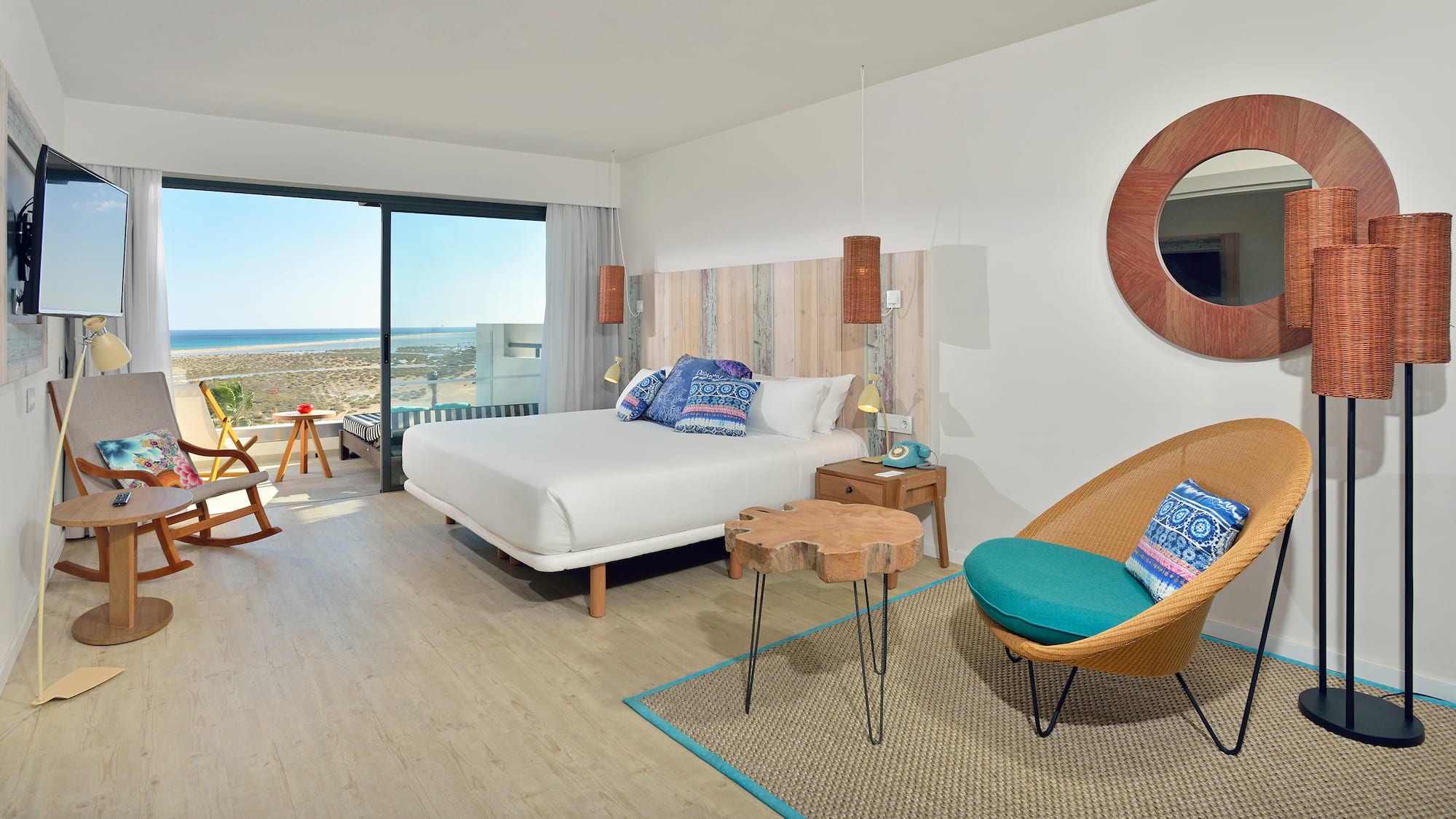 a room with a bed and a chair