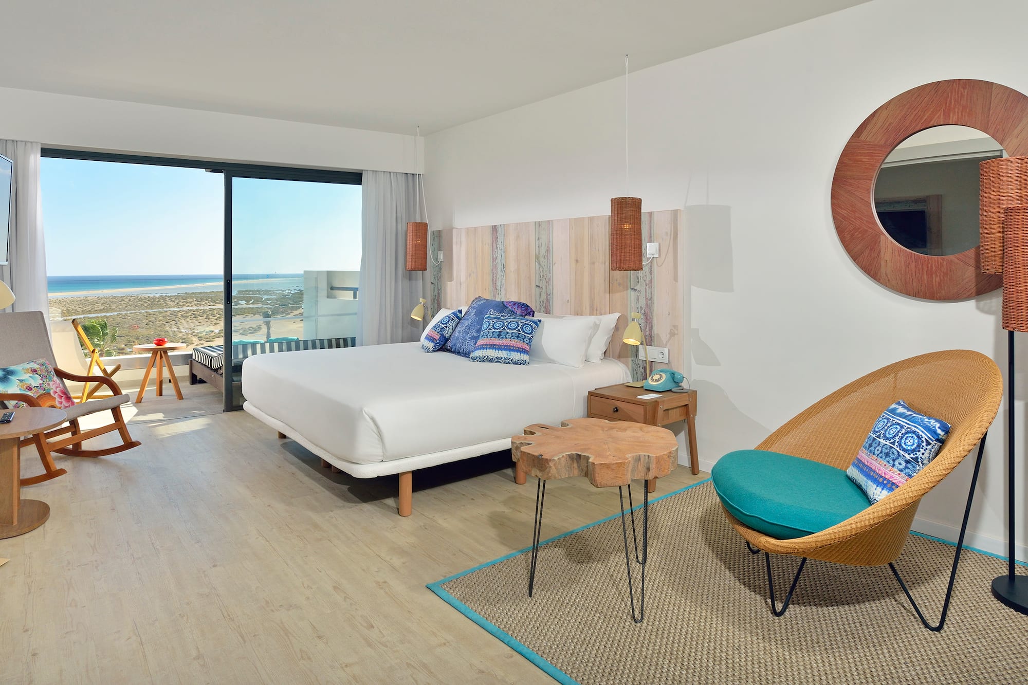 a room with a bed and a chair