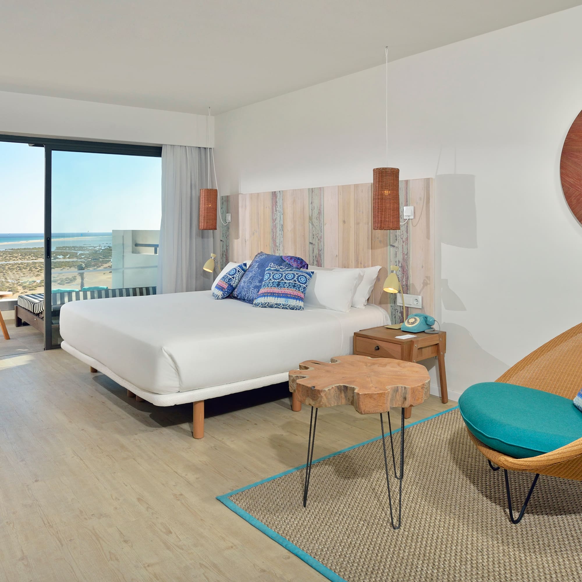 a room with a bed and a chair