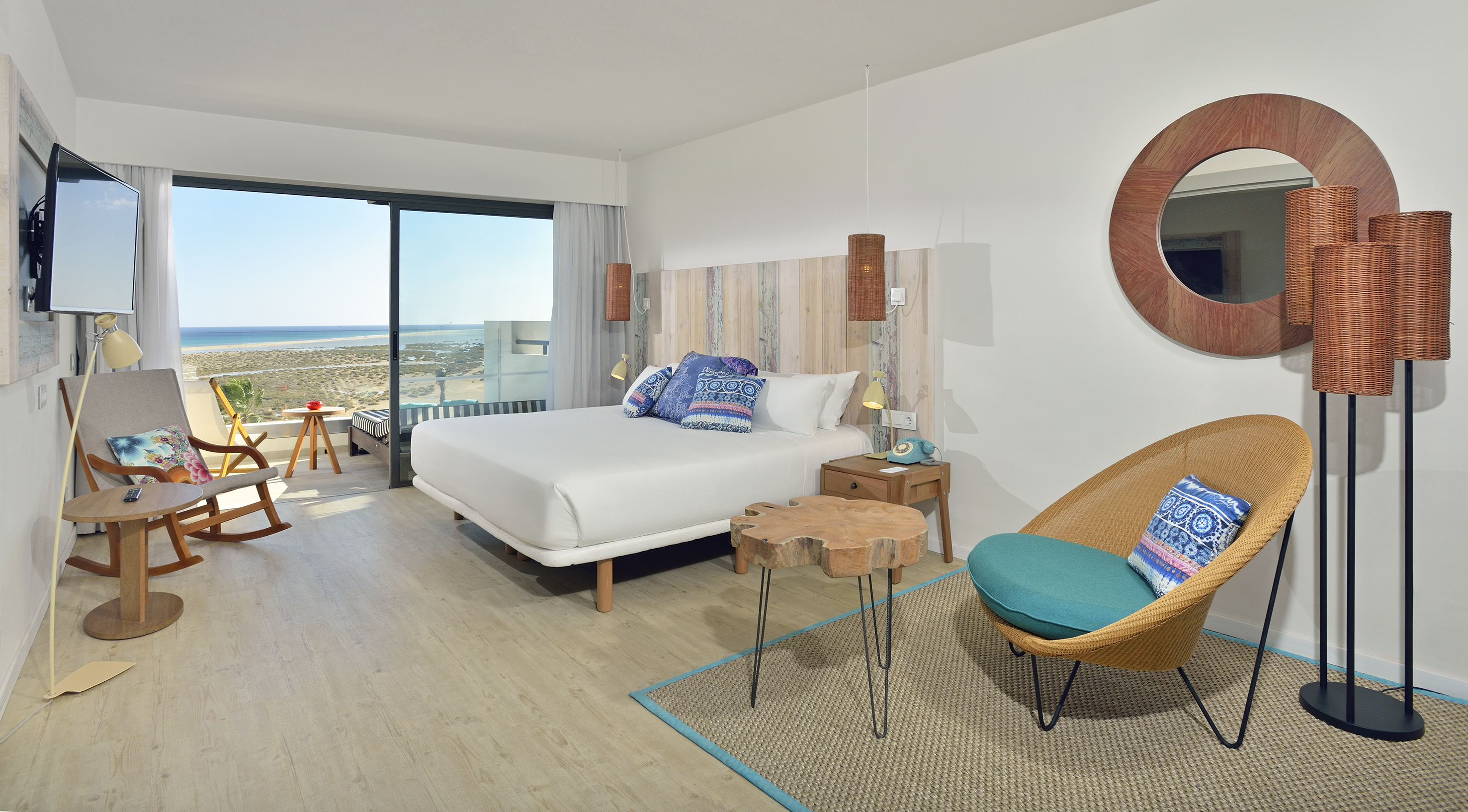 a room with a bed and a chair