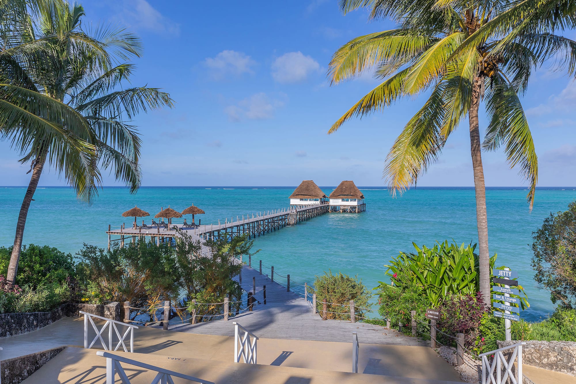 a dock with huts on it