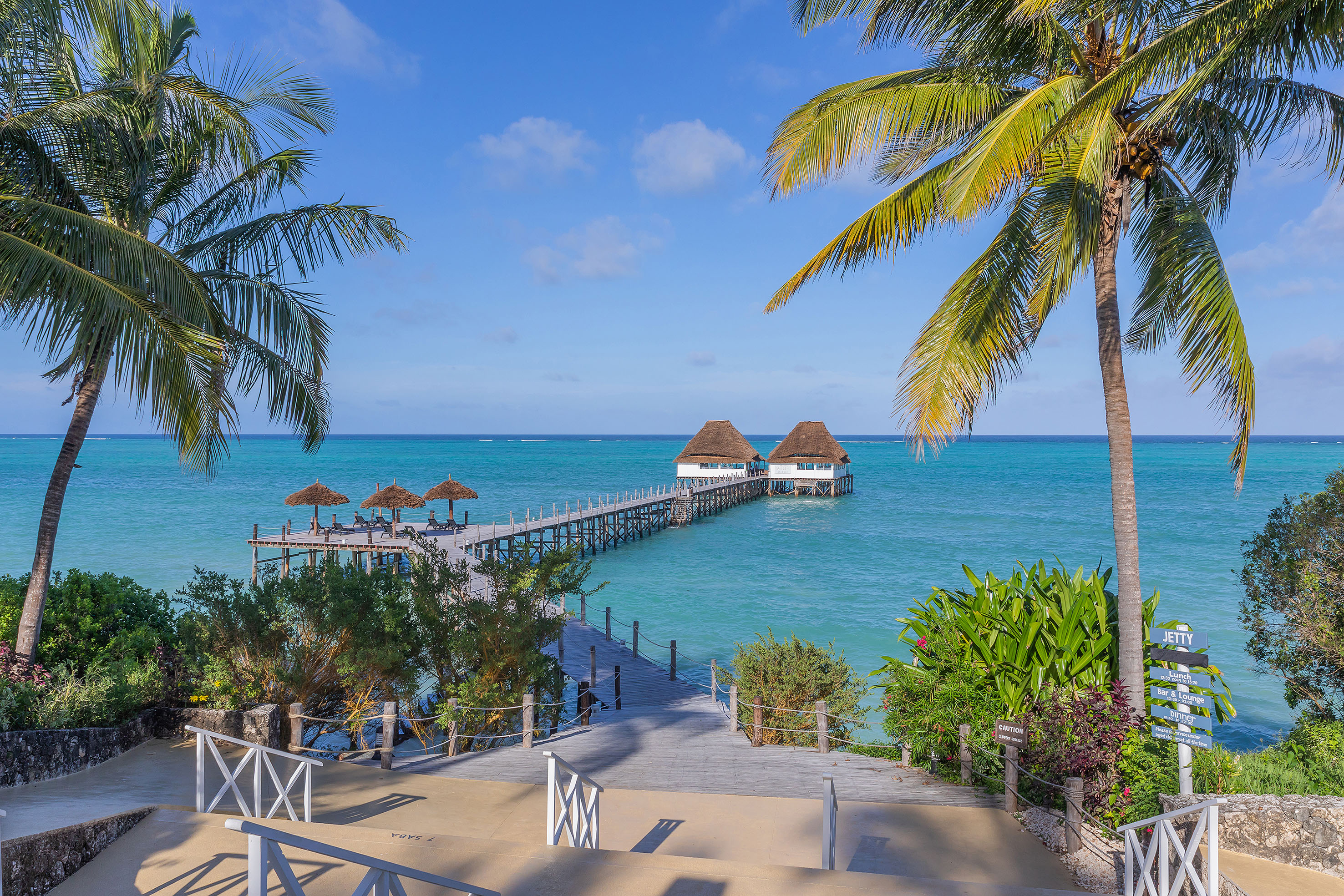 a dock with huts on it