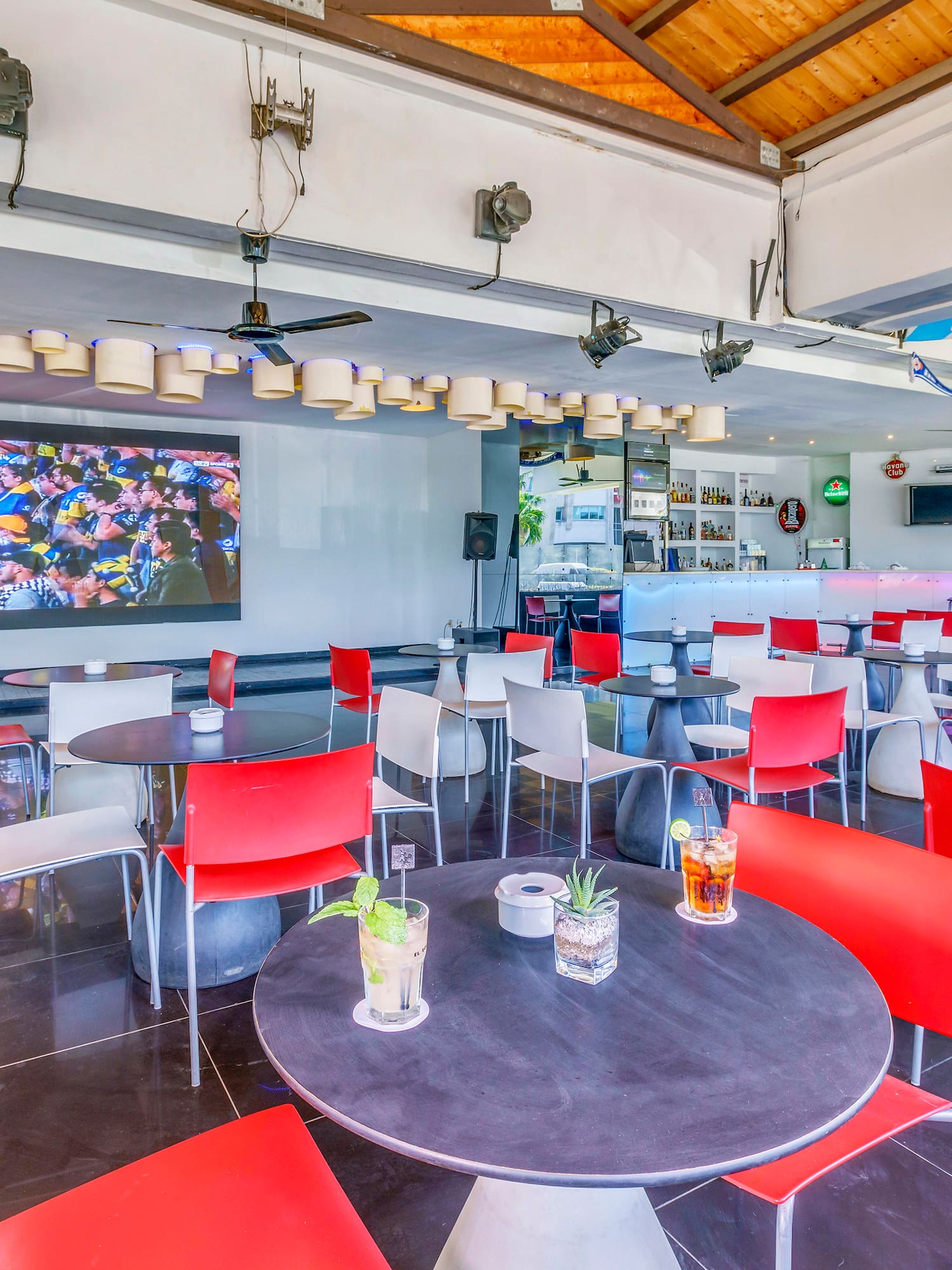 a room with tables and chairs