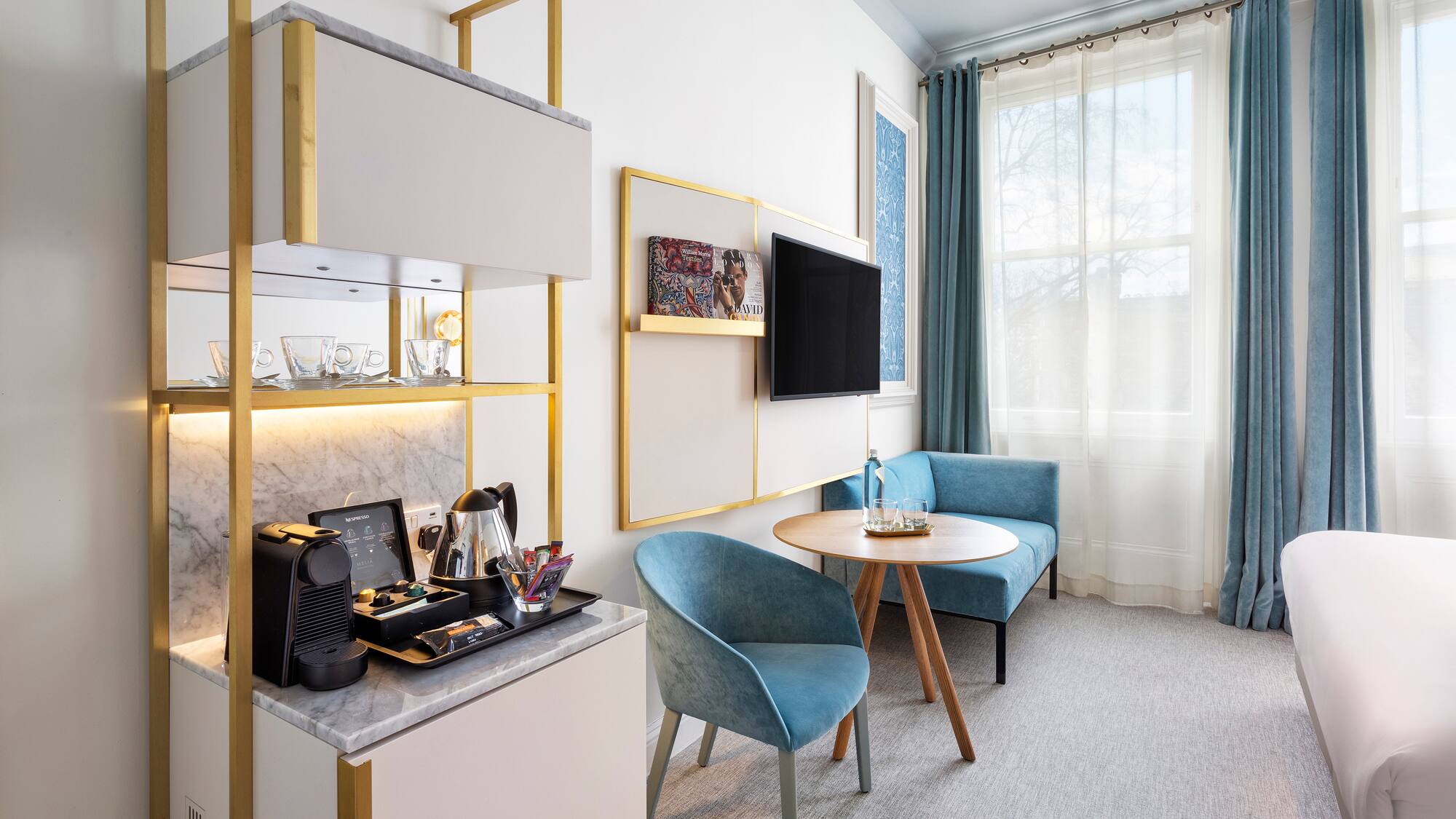 a room with a tv and a table