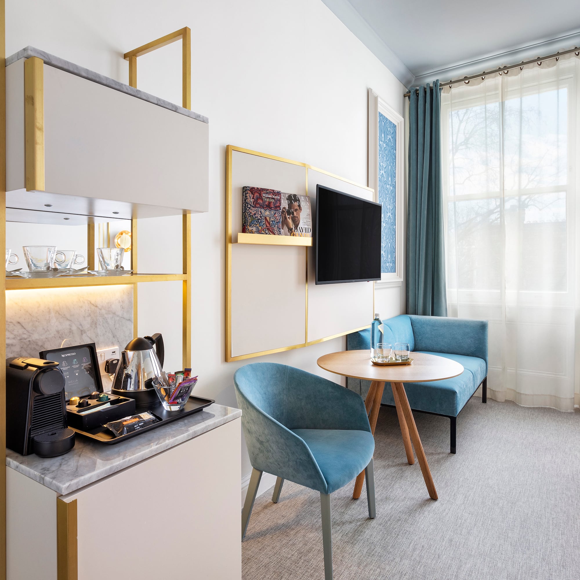 a room with a tv and a table