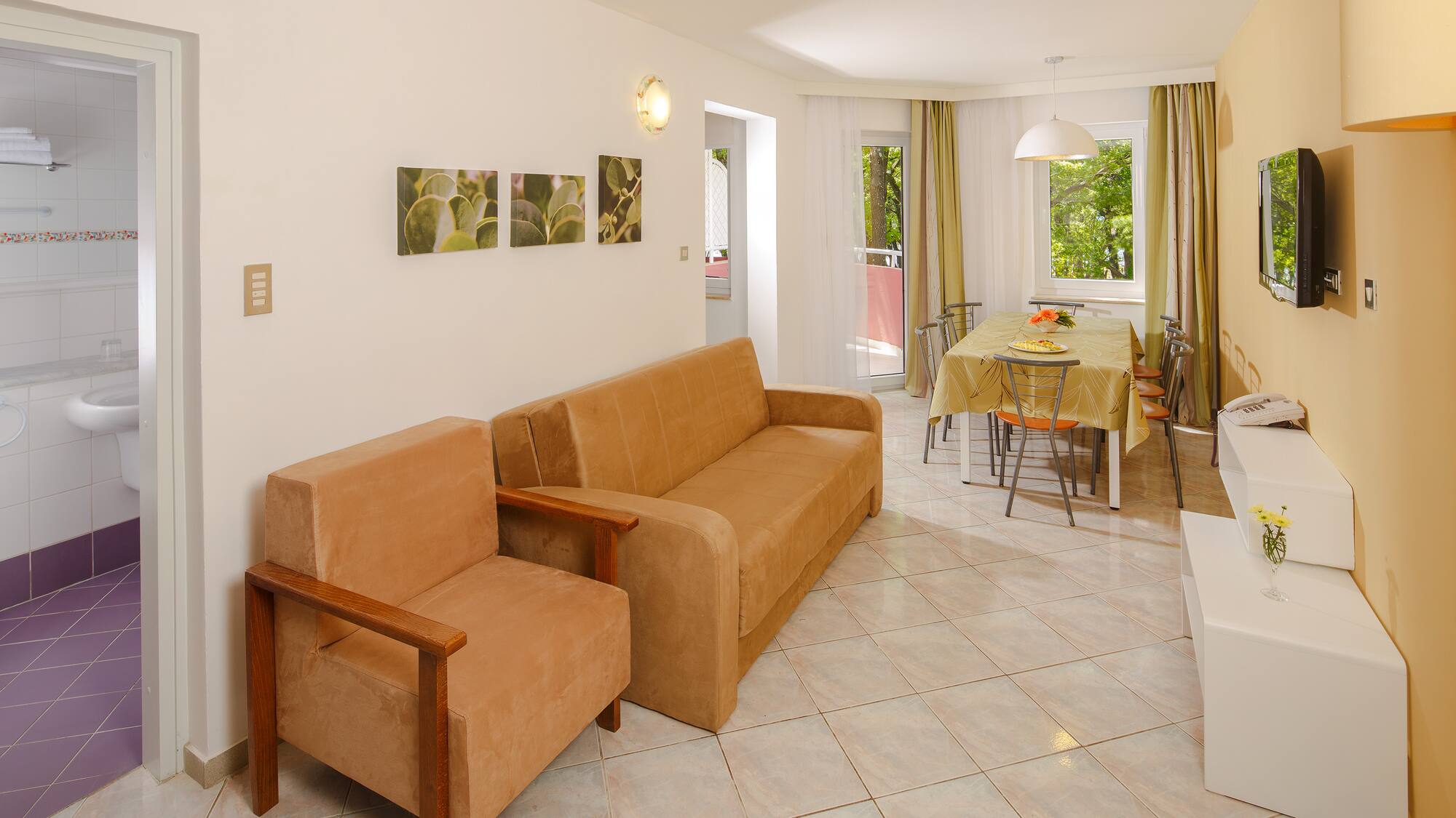 a living room with a couch and a table