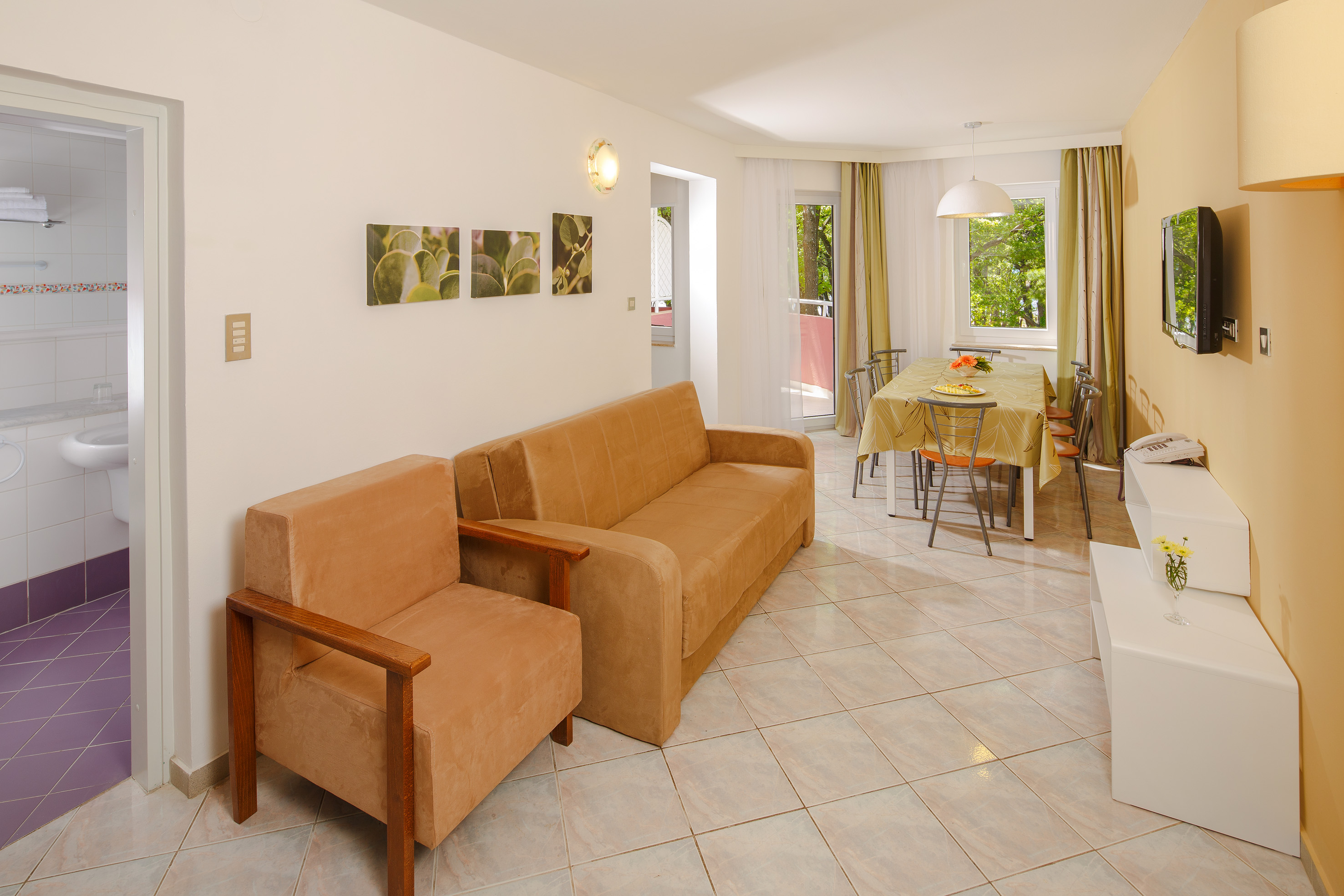 a living room with a couch and a table