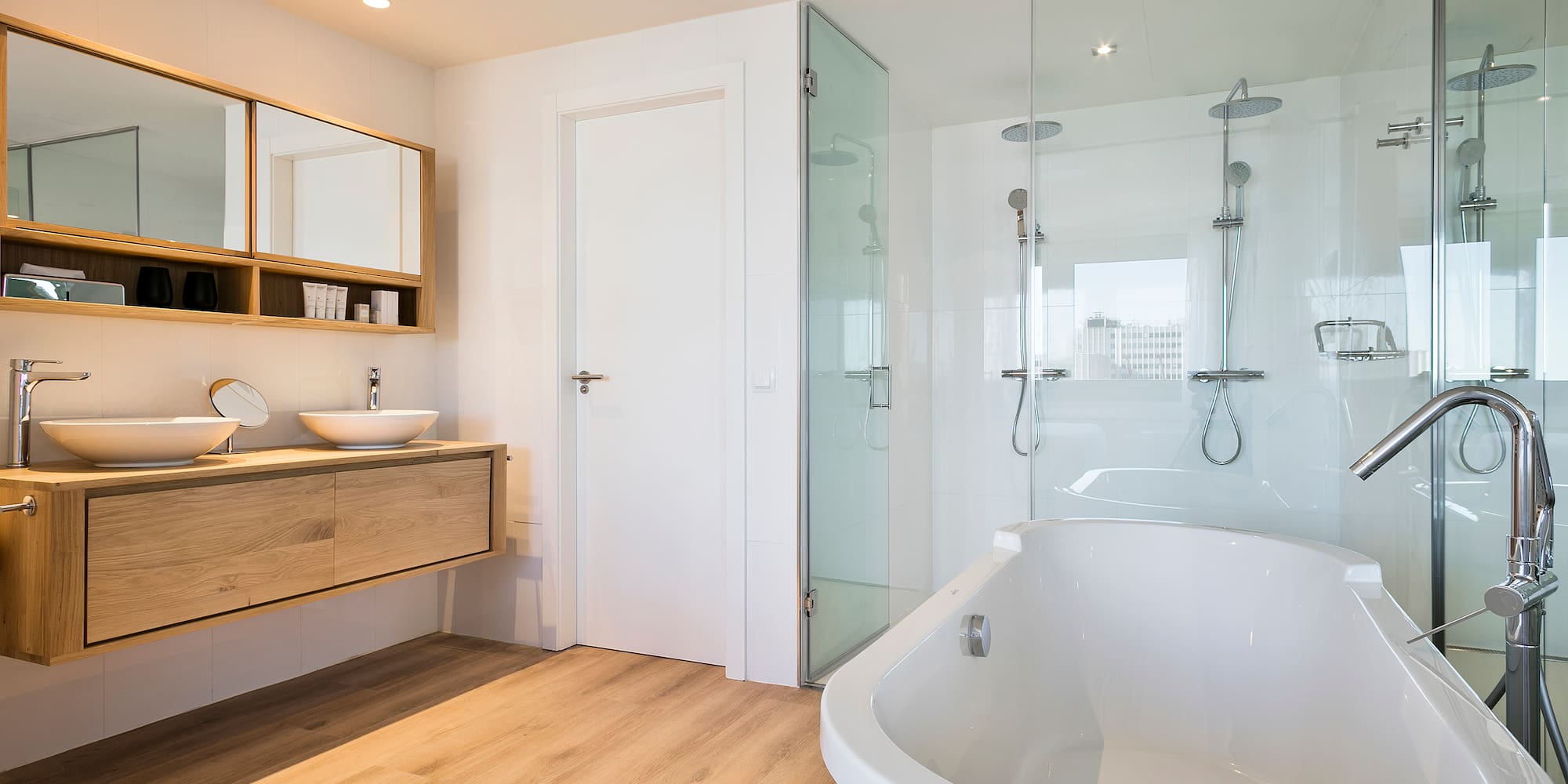 a bathroom with a tub and sink
