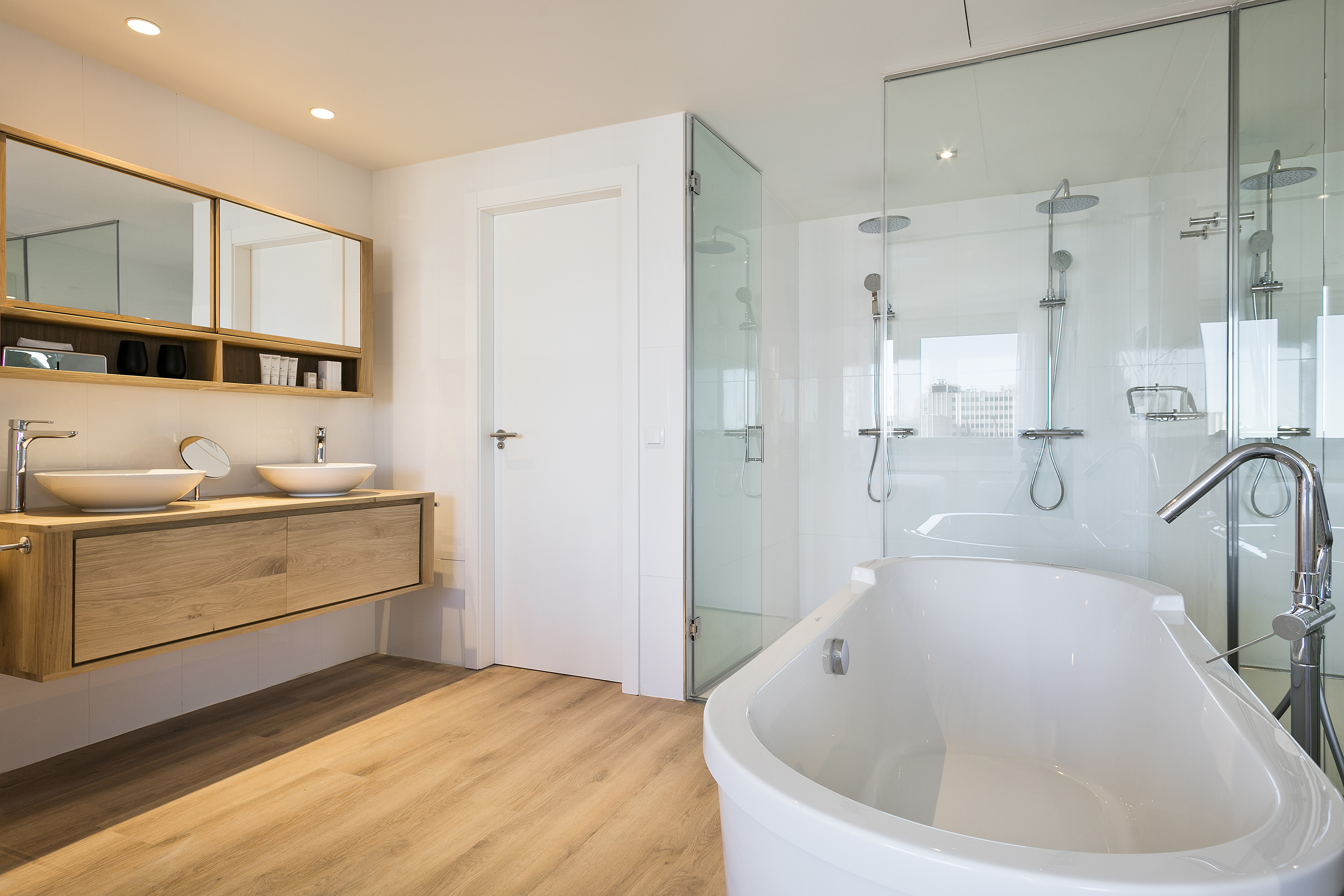 a bathroom with a tub and sink