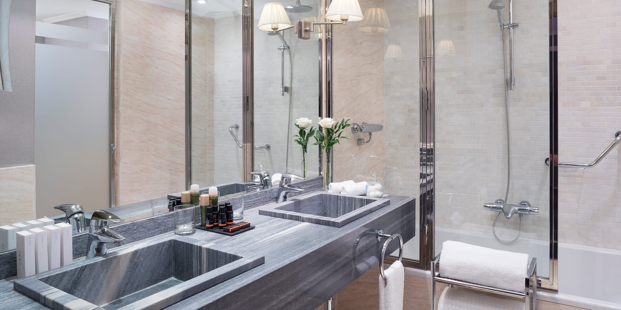 a bathroom with a shower and sink